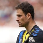 Headline: “Veteran Shot-Stopper Asmir Begović Secures Premier League Return with Leicester City After Ipswich Spell”….