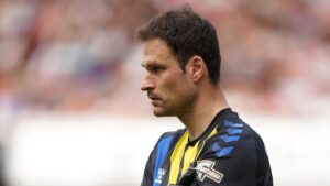 Headline: “Veteran Shot-Stopper Asmir Begović Secures Premier League Return with Leicester City After Ipswich Spell”….